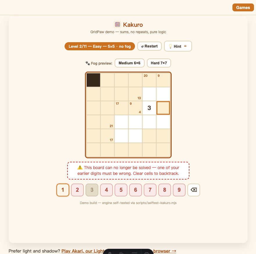 A selected cell in Kakuro with the keypad showing amber, struck-through and pink digits